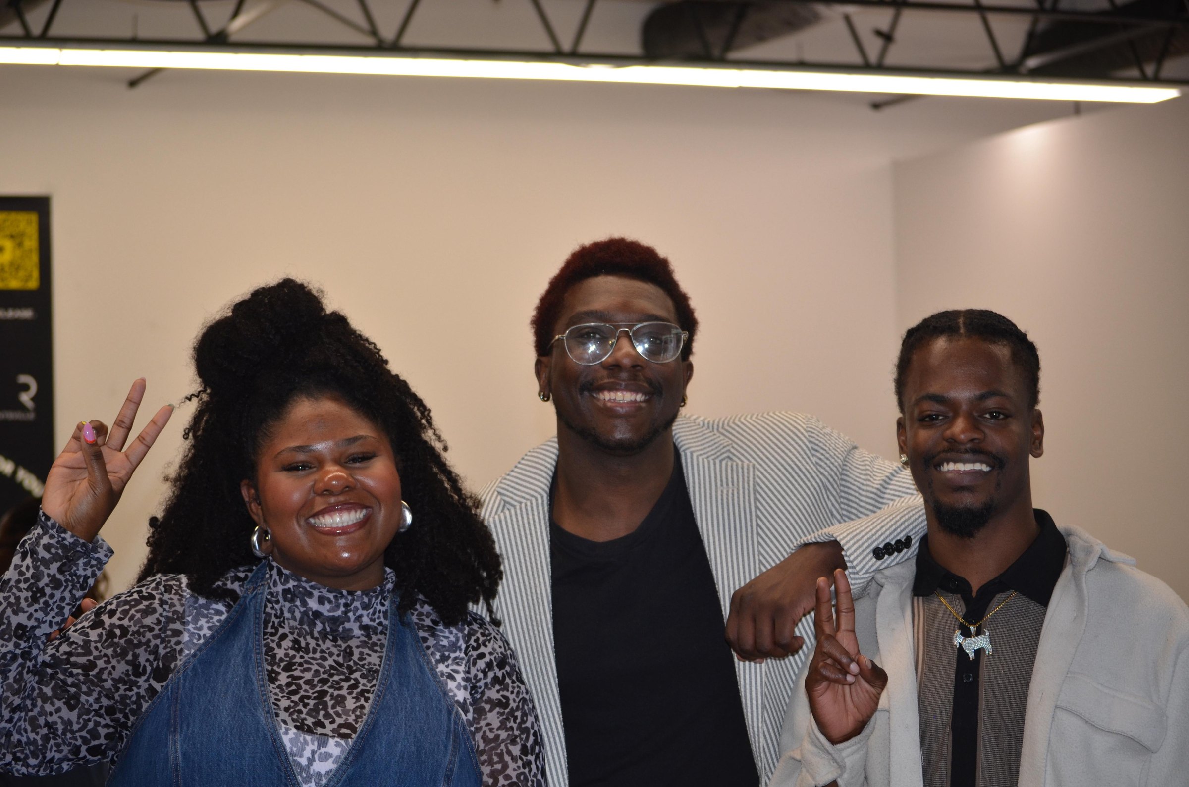 Three friends smiling together after a service