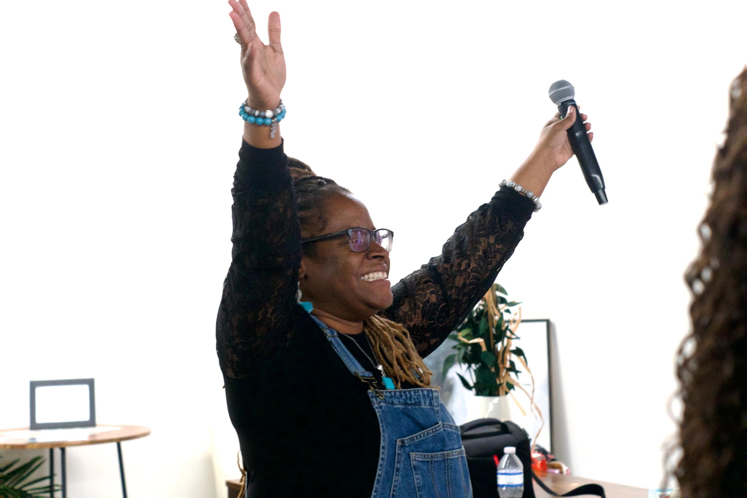 Hands raised in joyful worship